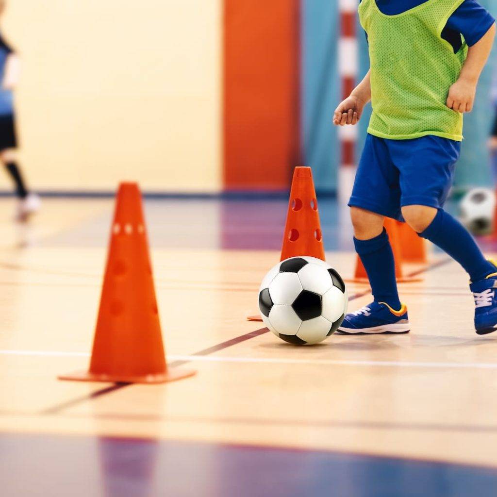 Indoor Soccer Class For Kids At School Sports Hall