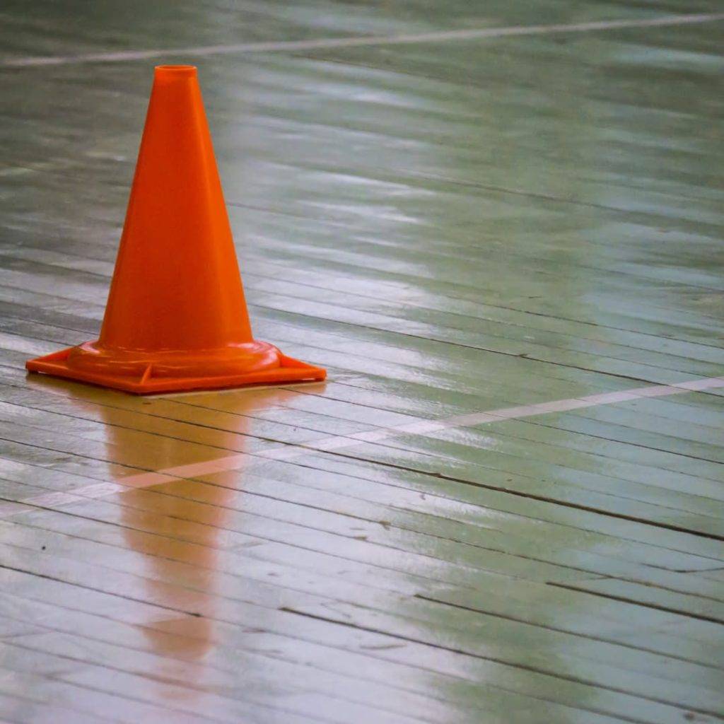 Interior Of A Gym At School, Red Cones On The Floor