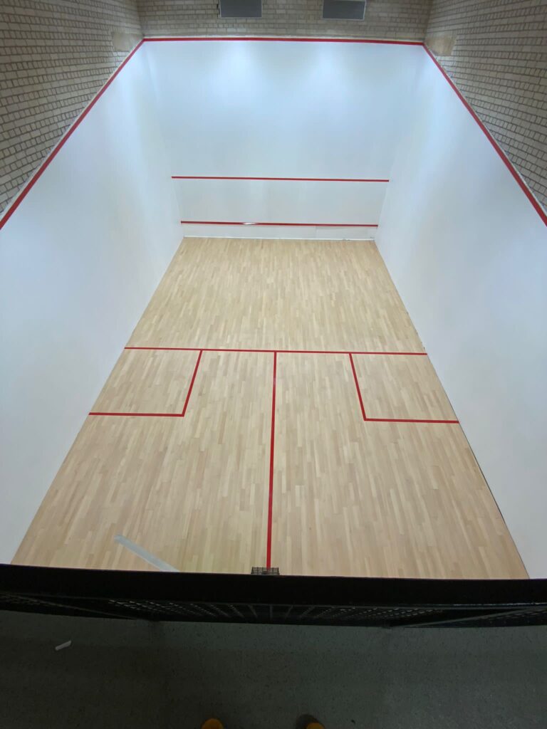 Squash court floor refurbishment in progress