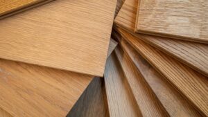 Various wooden floor samples displayed in a fan arrangement